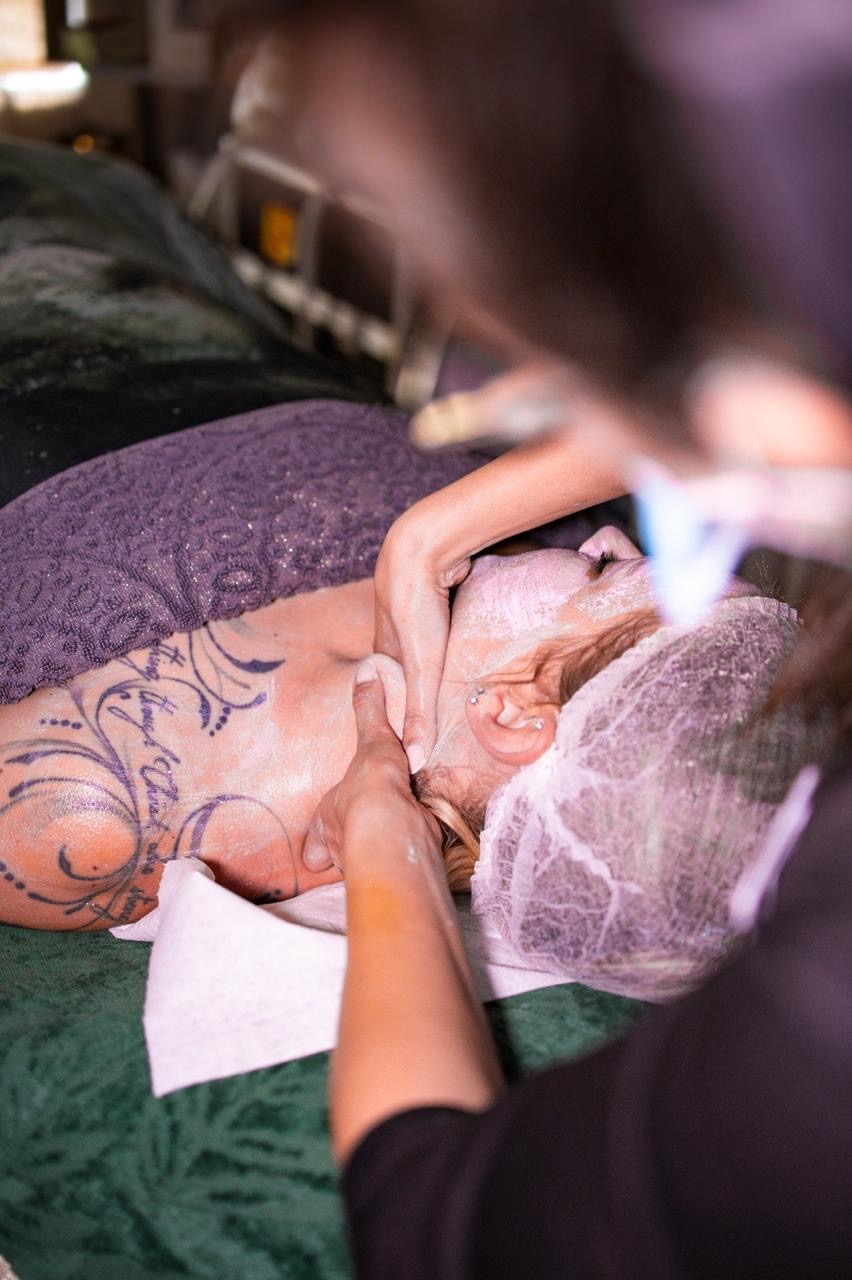 Hands-on facial care during an appointment